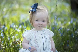 Little girl photo with blue bow in hair