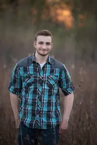 Nature senior photo with plaid shirt in Rockford, IL