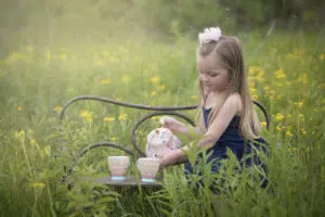 Photographers picture of girl's tea party in the park