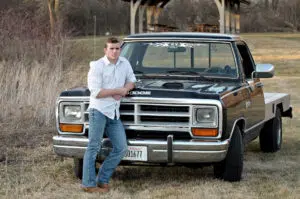 Professional senior photo with his Dodge truck