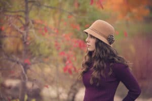 Profile of girl in fall colors during senior photos session.