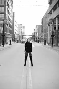 Black and White photo of senior girl in downtown Rockford, IL
